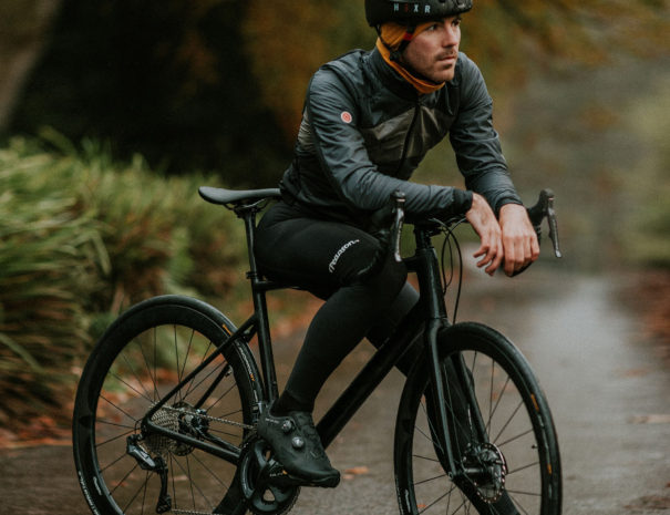 lone cyclist all in black photo by ZoltanTasi on Unsplash - crop - Copy